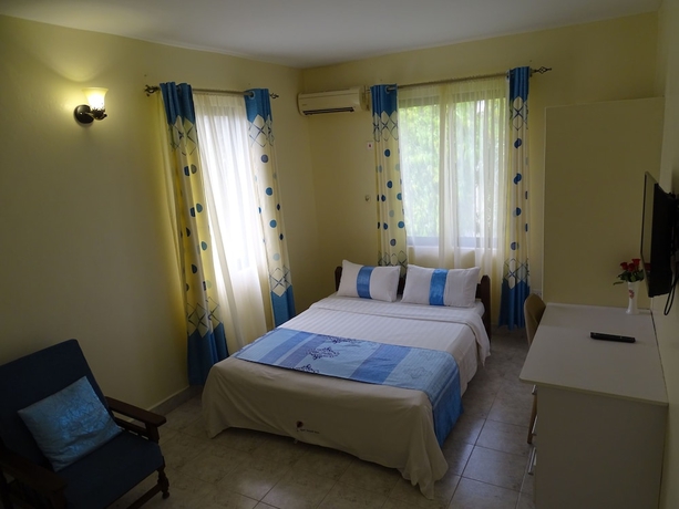 Imagen de la habitación del Hotel Nyali Parkside Resort. Foto 9