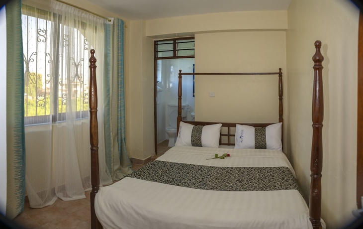 Imagen de la habitación del Hotel Nyali Parkside Resort. Foto 12