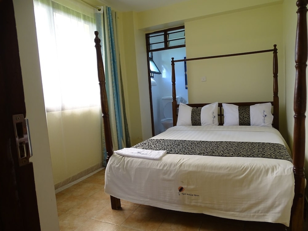 Imagen de la habitación del Hotel Nyali Parkside Resort. Foto 13