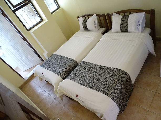 Imagen de la habitación del Hotel Nyali Parkside Resort. Foto 14
