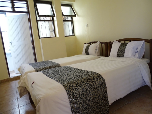 Imagen de la habitación del Hotel Nyali Parkside Resort. Foto 15
