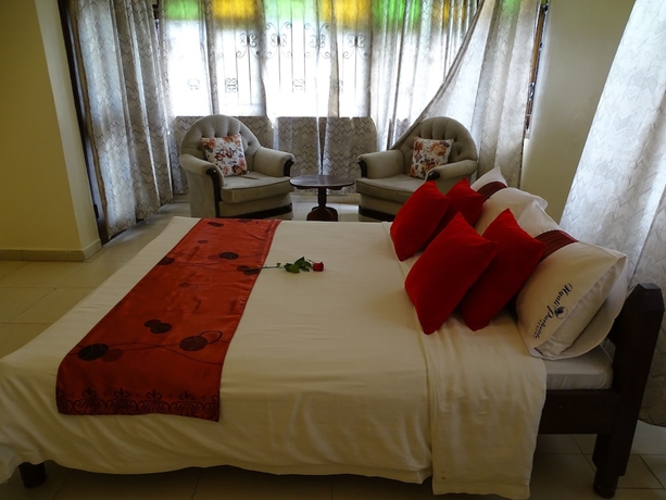 Imagen de la habitación del Hotel Nyali Parkside Resort. Foto 19