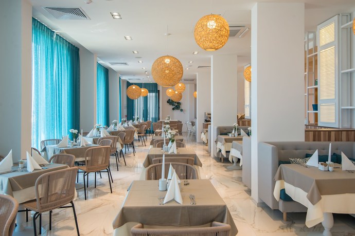 Imagen del bar/restaurante del Hotel Nympha All Inclusive - Riviera Holiday Club. Foto 5