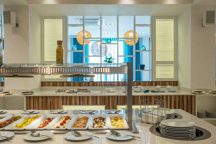 Imagen del bar/restaurante del Hotel Nympha All Inclusive - Riviera Holiday Club. Foto 7
