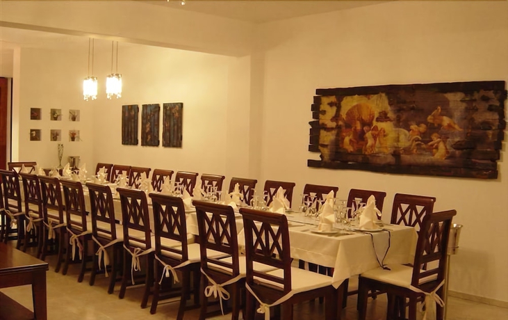 Imagen del bar/restaurante del Hotel Nymphes Luxury Apartments. Foto 7