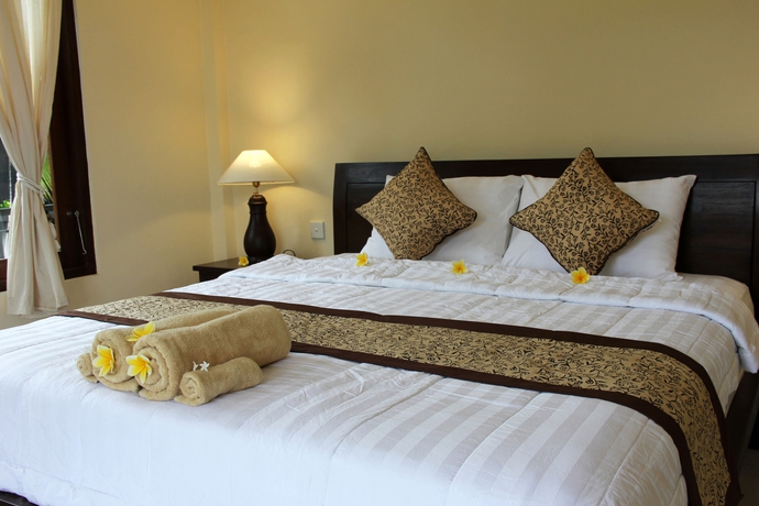 Imagen de la habitación del Hotel Nyoman Sandi Guest House. Foto 2