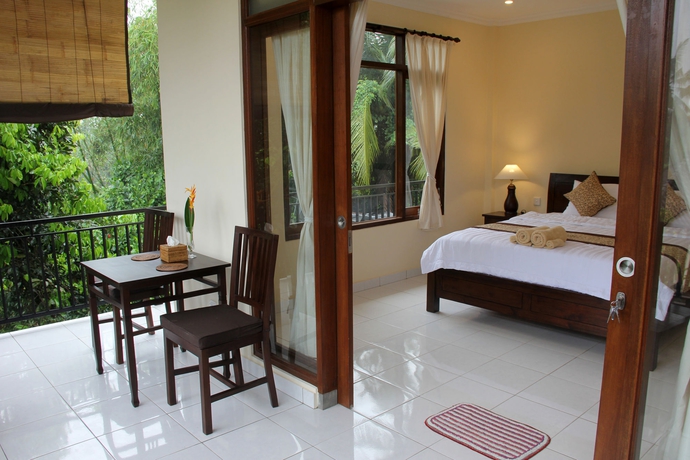 Imagen de la habitación del Hotel Nyoman Sandi Guest House. Foto 4