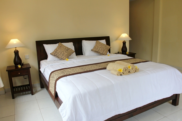 Imagen de la habitación del Hotel Nyoman Sandi Guest House. Foto 5