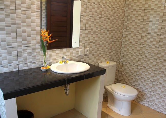 Imagen de la habitación del Hotel Nyoman Sandi Guest House. Foto 7