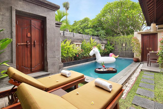 Imagen de la habitación del Hotel Nyuh Bali Luxury Villas. Foto 6