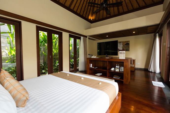 Imagen de la habitación del Hotel Nyuh Bali Luxury Villas. Foto 8