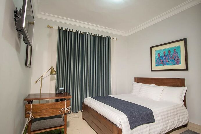 Imagen de la habitación del Hotel Nyumbani Cottages. Foto 18