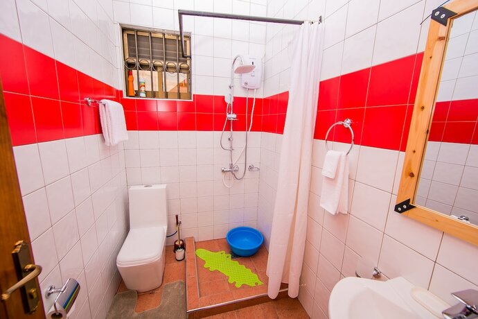 Imagen de la habitación del Hotel Nyumbani Cottages. Foto 19