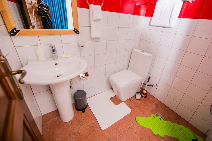 Imagen de la habitación del Hotel Nyumbani Cottages. Foto 21