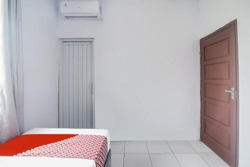 Imagen general del Hotel O 3m Kost Dan Homestay. Foto 2