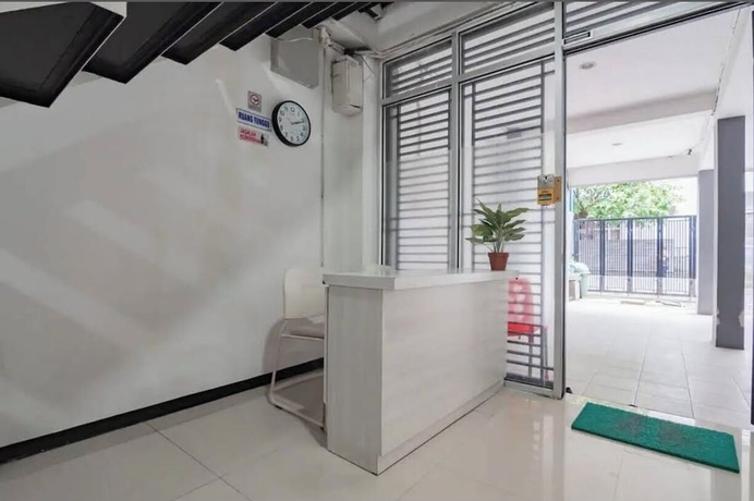 Imagen de los interiores del Hotel O 95063 Afifah Syariah Guest House Manado. Foto 9