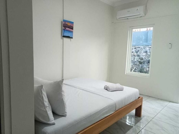 Imagen de la habitación del Hotel O 95063 Afifah Syariah Guest House Manado. Foto 6