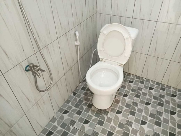 Imagen de la habitación del Hotel O 95063 Afifah Syariah Guest House Manado. Foto 7