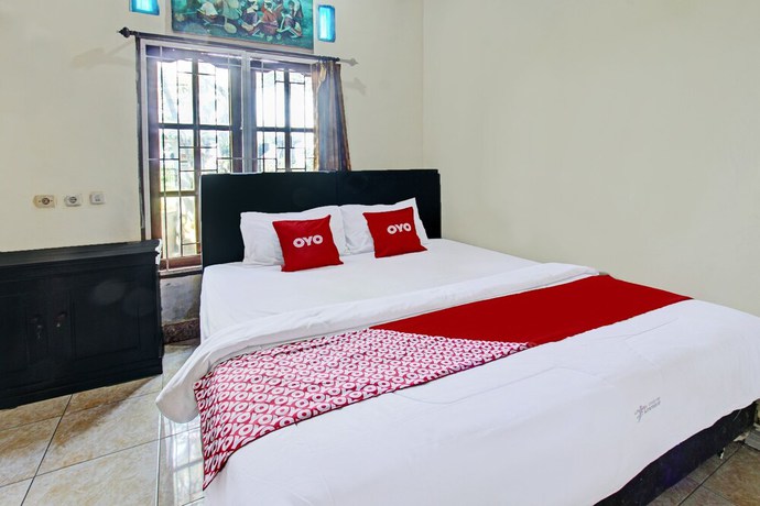 Imagen de la habitación del Hotel O Archi Homestay. Foto 5