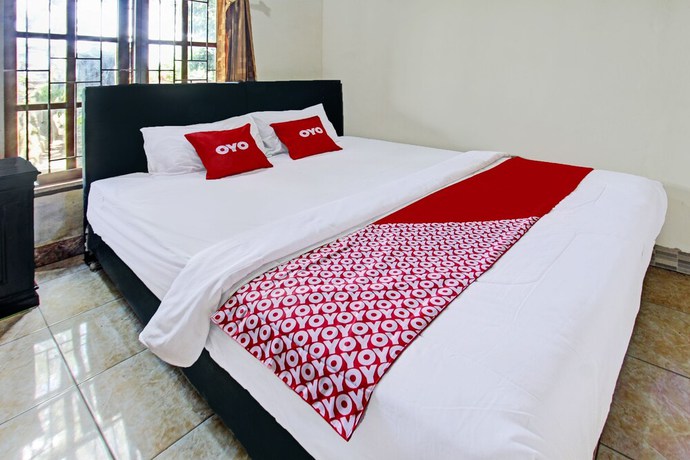 Imagen de la habitación del Hotel O Archi Homestay. Foto 9