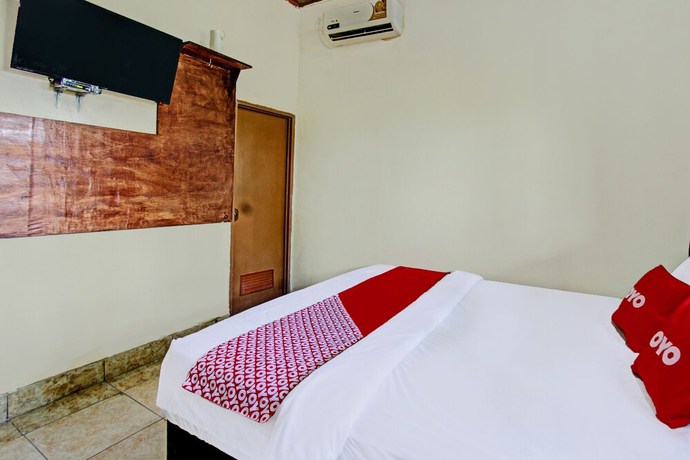Imagen de la habitación del Hotel O Archi Homestay. Foto 10