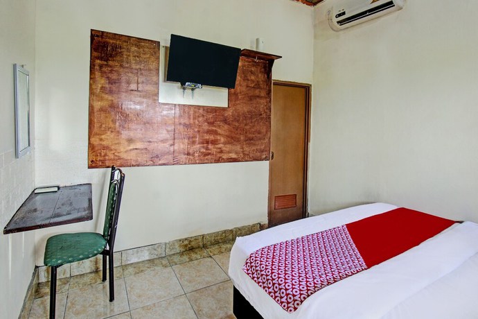 Imagen de la habitación del Hotel O Archi Homestay. Foto 12