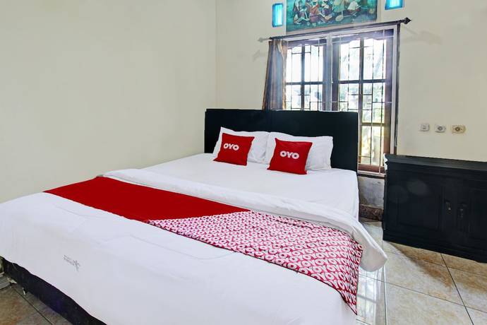 Imagen de la habitación del Hotel O Archi Homestay. Foto 13