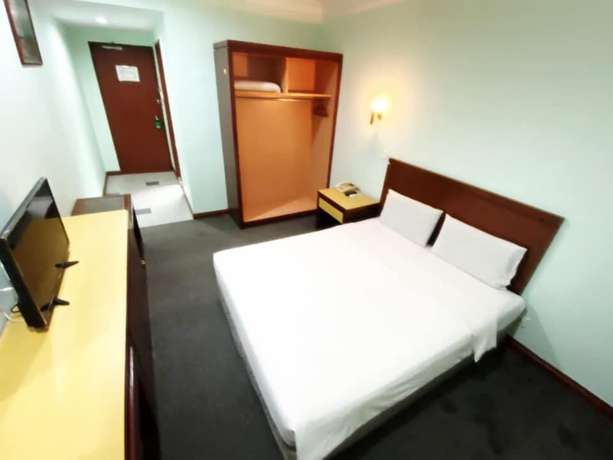 Imagen de la habitación del Hotel O Asia City. Foto 3