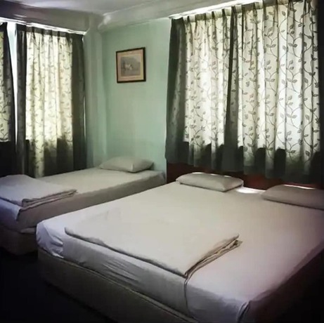 Imagen de la habitación del Hotel O Asia City. Foto 5