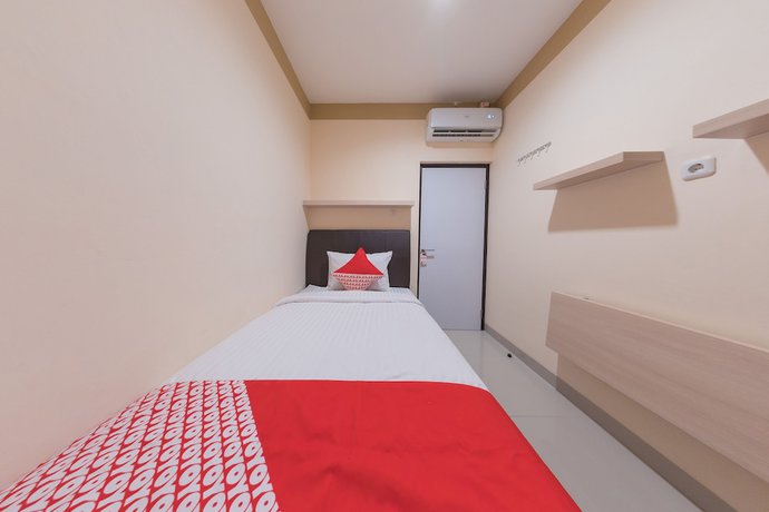 Imagen de la habitación del Hotel O Balcon Biru. Foto 5