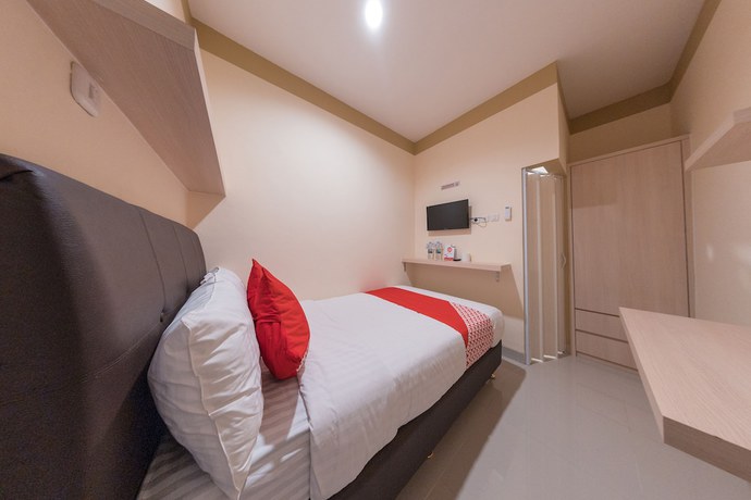Imagen de la habitación del Hotel O Balcon Biru. Foto 8