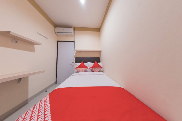 Imagen de la habitación del Hotel O Balcon Biru. Foto 10