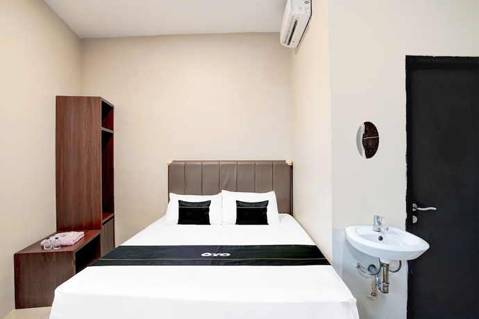 Imagen de la habitación del Hotel O Balikpapan near Siloam Hospital formerly Syafla Guest House. Foto 11