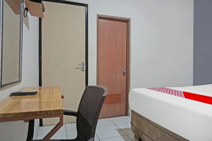 Imagen de la habitación del Hotel O Bogor Guest House. Foto 15