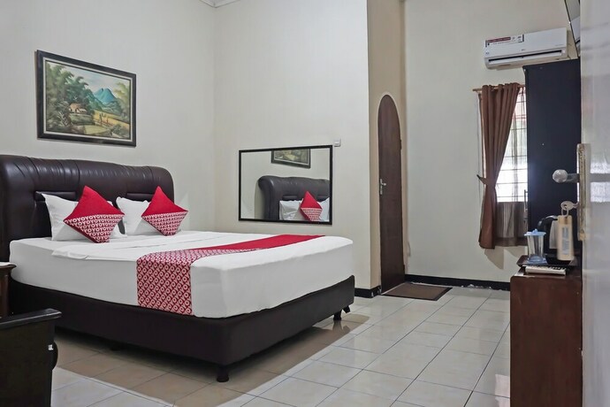 Imagen de la habitación del Hotel O Bogor Guest House. Foto 20