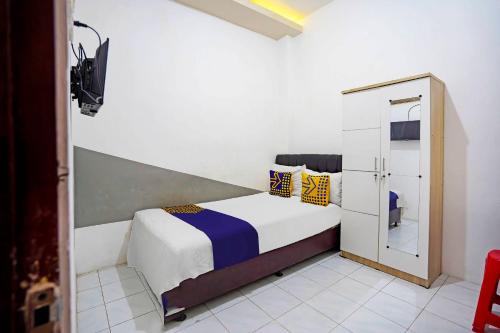 Imagen de la habitación del Hotel O Dago Near Bandung Zoo Formerly Chatter Place. Foto 13