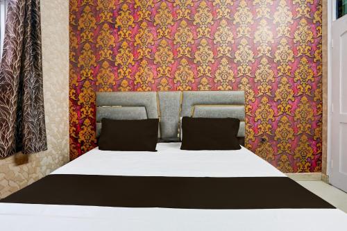 Imagen de la habitación del Hotel O Dhindsa Haveli. Foto 14