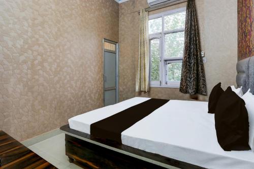 Imagen de la habitación del Hotel O Dhindsa Haveli. Foto 15