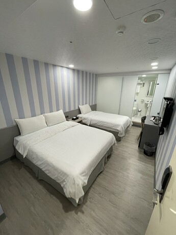 Imagen de la habitación del Hotel O Fun. Foto 20