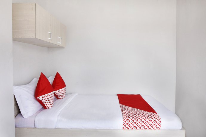 Imagen de la habitación del Hotel O GP Residence. Foto 10
