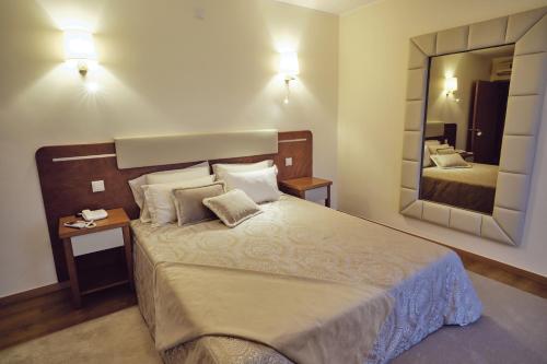 Imagen de la habitación del Hotel O Guerreiro. Foto 17