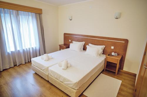 Imagen de la habitación del Hotel O Guerreiro. Foto 18