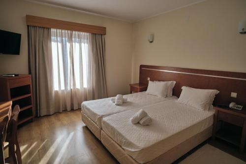 Imagen de la habitación del Hotel O Guerreiro. Foto 20