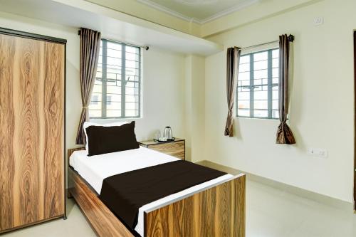 Imagen de la habitación del Hotel O HOMEDINE. Foto 20