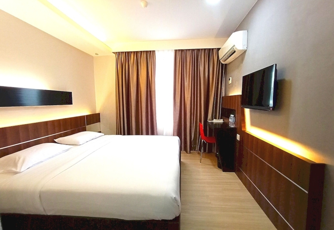 Imagen de la habitación del Hotel O Hi Inn. Foto 2