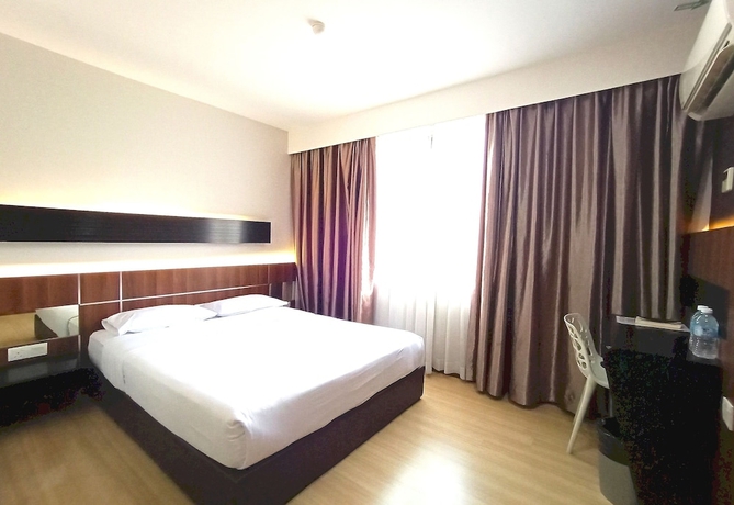Imagen de la habitación del Hotel O Hi Inn. Foto 9