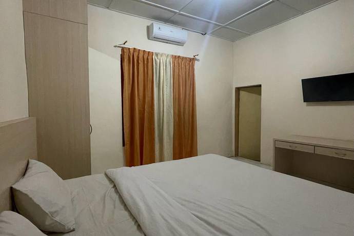 Imagen de la habitación del Hotel O Homestay Pakmuklis Syariah 2 Near Taman Mini Lhokseumawe. Foto 2
