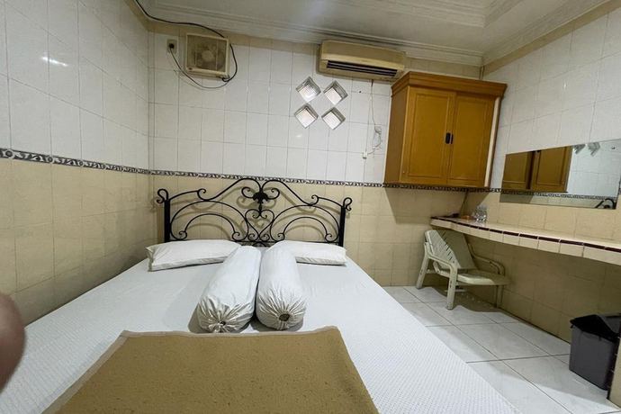 Imagen de la habitación del Hotel O Homestay Pakmuklis Syariah 2 Near Taman Mini Lhokseumawe. Foto 4