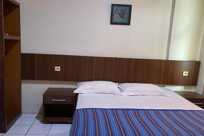 Imagen de la habitación del Hotel O Homestay Pakmuklis Syariah 2 Near Taman Mini Lhokseumawe. Foto 6