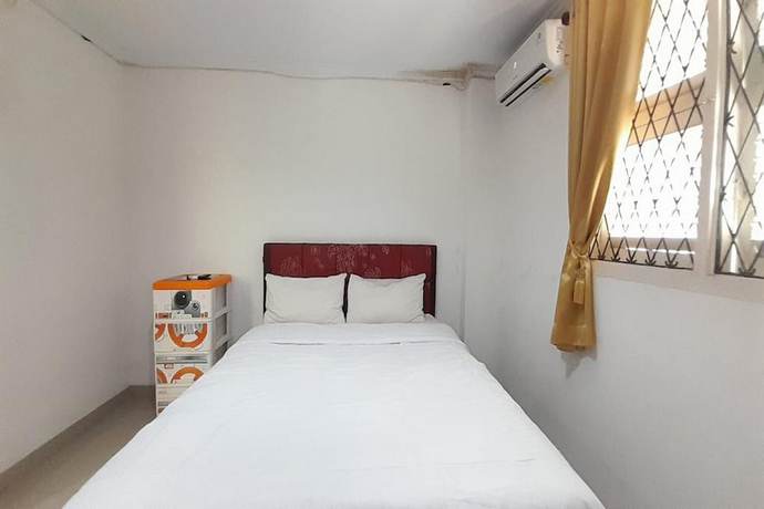 Imagen de la habitación del Hotel O Homestay Pakmuklis Syariah 2 Near Taman Mini Lhokseumawe. Foto 14
